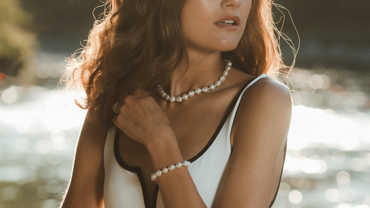 Welche Bedeutung hat eine Perlenkette bei einer Frau?
